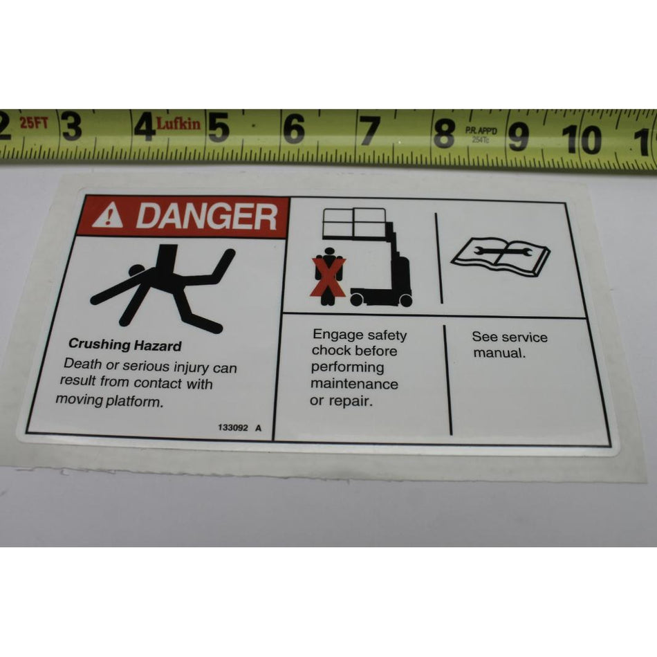 Genie Part # 133092. 133092GT - DECAL.CRUSH HAZARD.USE SAFETY