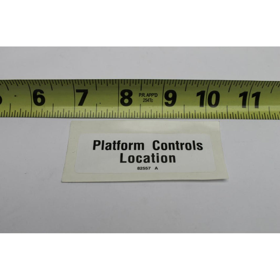 Genie Part # 82557. 82557GT - DECAL. LABEL. PLAT CONT LOCATION